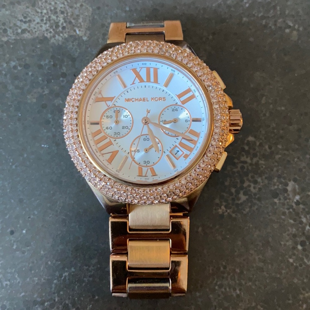 Rose gold Michael kors watch. About a 40-42 mm case. New battery.